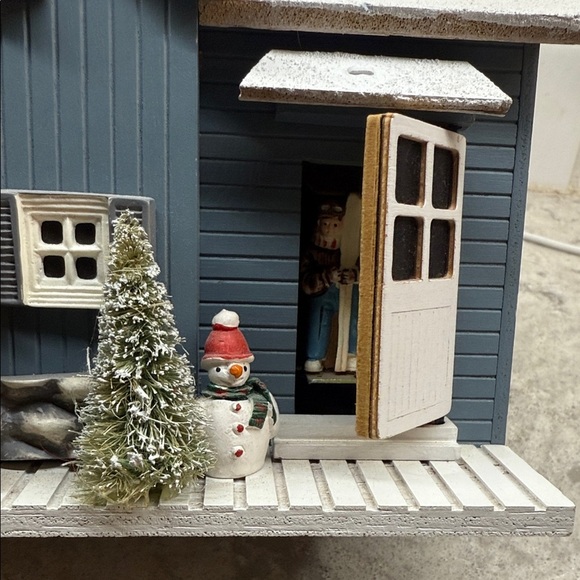 Animated musical ski chalet Winter Wonderland and door opens reveals skier - Picture 8 of 13